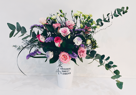 Elegant Blushes in Tall Vase